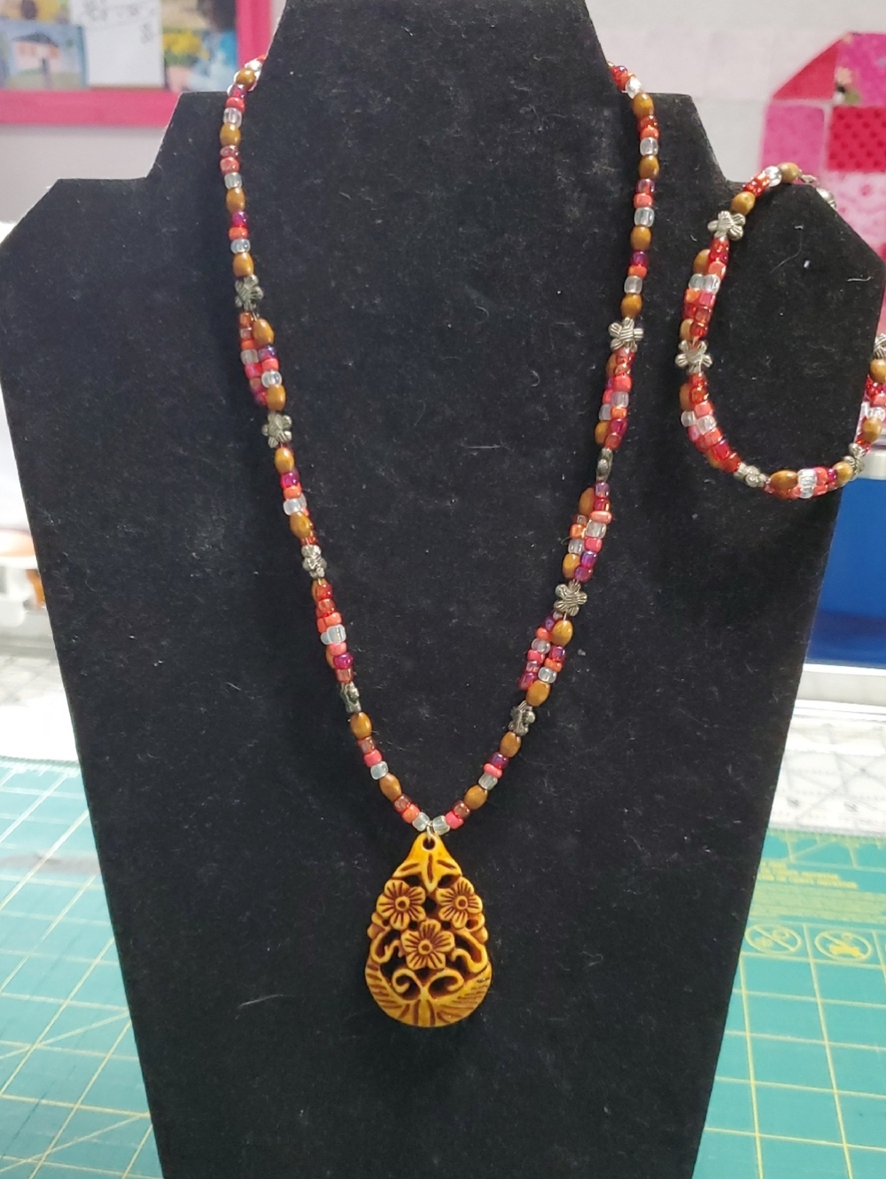 Carved Floral Teardrop Pendant Necklace in Red, Pink & Tan